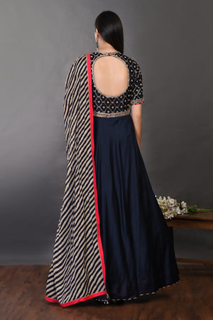 Buy navy blue chanderi Anarkali suit online in USA with dupatta. Dazzle on weddings and special occasions with exquisite Indian designer dresses, sharara suits, Anarkali suits, wedding lehengas from Pure Elegance Indian fashion store in USA.-back