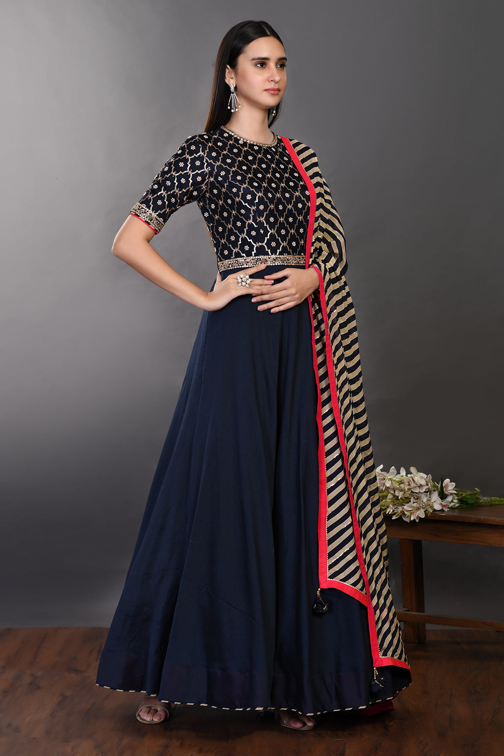 Buy navy blue chanderi Anarkali suit online in USA with dupatta. Dazzle on weddings and special occasions with exquisite Indian designer dresses, sharara suits, Anarkali suits, wedding lehengas from Pure Elegance Indian fashion store in USA.-right