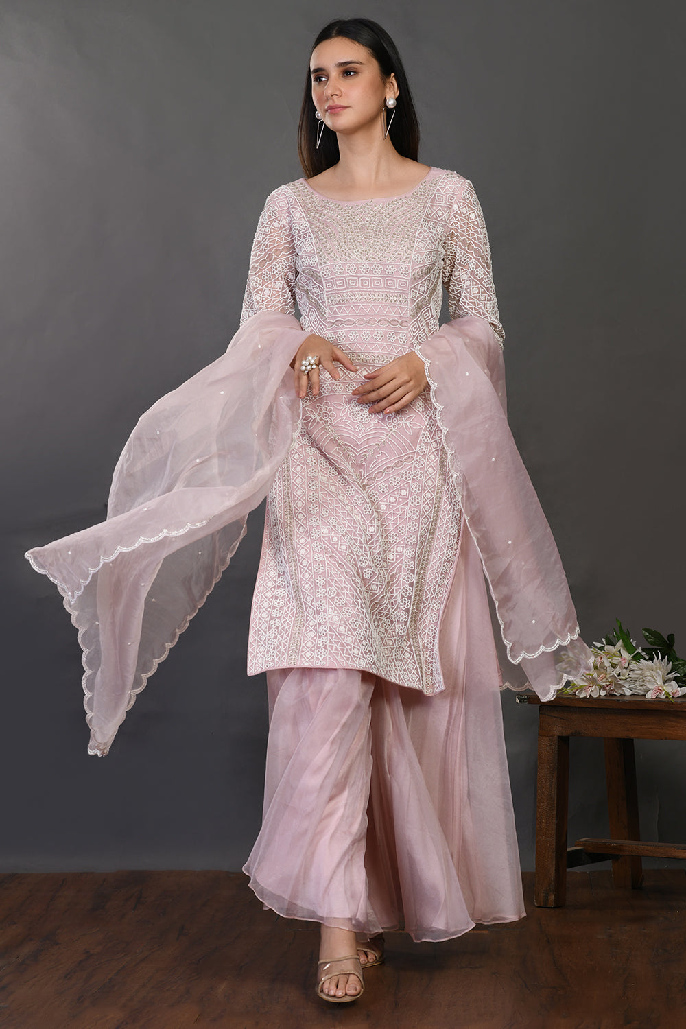 Shop powder pink embroidered organza sharara suit online in USA with dupatta. Dazzle on weddings and special occasions with exquisite Indian designer dresses, sharara suits, Anarkali suits, wedding lehengas from Pure Elegance Indian fashion store in USA.-full view