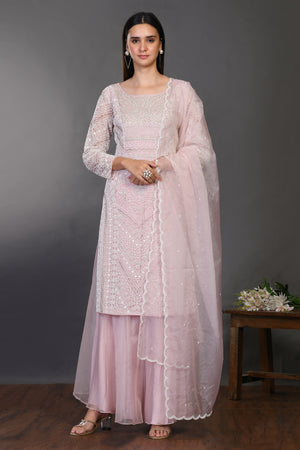 Shop powder pink embroidered organza sharara suit online in USA with dupatta. Dazzle on weddings and special occasions with exquisite Indian designer dresses, sharara suits, Anarkali suits, wedding lehengas from Pure Elegance Indian fashion store in USA.-full view