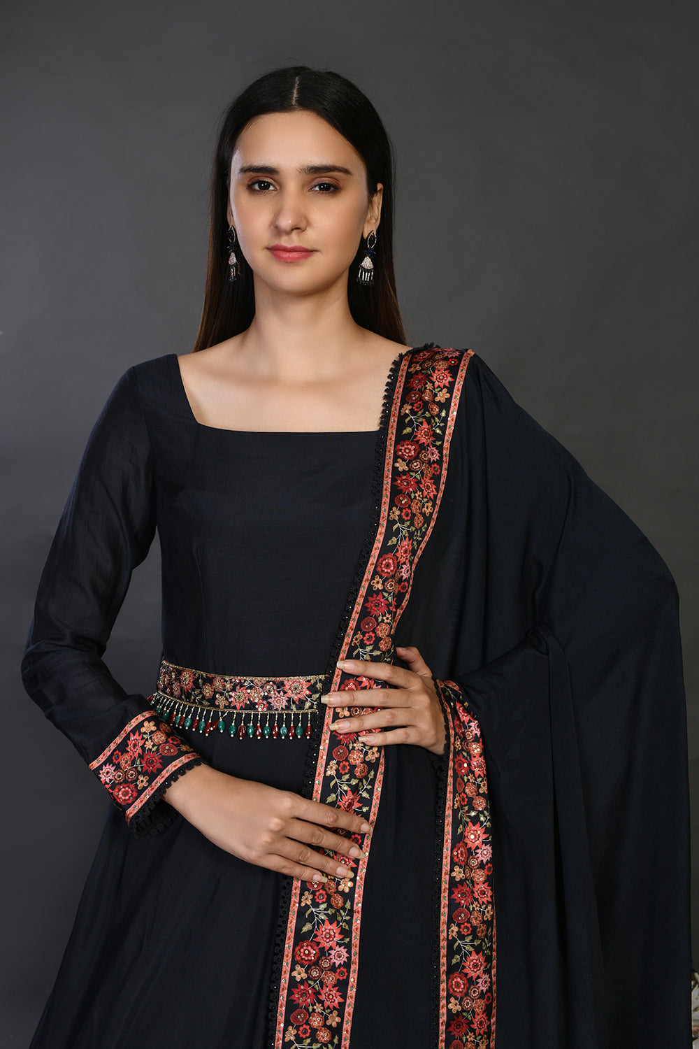 Shop black floorlength embroidered muslin Anarkali online in USA with dupatta. Dazzle on weddings and special occasions with exquisite Indian designer dresses, sharara suits, Anarkali suits, wedding lehengas from Pure Elegance Indian fashion store in USA.-closeup