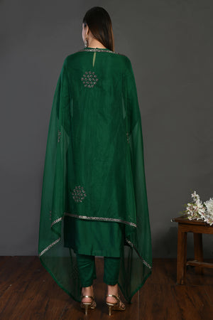 Buy bottle green cutdana work chanderi suit online in USA with dupatta. Dazzle on weddings and special occasions with exquisite Indian designer dresses, sharara suits, Anarkali suits, wedding lehengas from Pure Elegance Indian fashion store in USA.-back