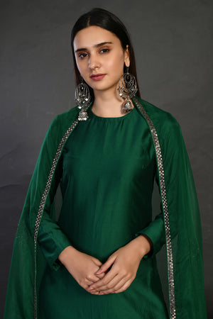 Buy bottle green cutdana work chanderi suit online in USA with dupatta. Dazzle on weddings and special occasions with exquisite Indian designer dresses, sharara suits, Anarkali suits, wedding lehengas from Pure Elegance Indian fashion store in USA.-closeup