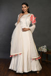 Shop cream embroidered floorlength Anarkali suit online in USA with dupatta. Dazzle on weddings and special occasions with exquisite Indian designer dresses, sharara suits, Anarkali suits, wedding lehengas from Pure Elegance Indian fashion store in USA.-full view