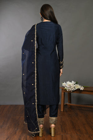Buy prussian blue zardozi work Mysore silk suit online in USA with dupatta. Dazzle on weddings and special occasions with exquisite Indian designer dresses, sharara suits, Anarkali suits, wedding lehengas from Pure Elegance Indian fashion store in USA.-back