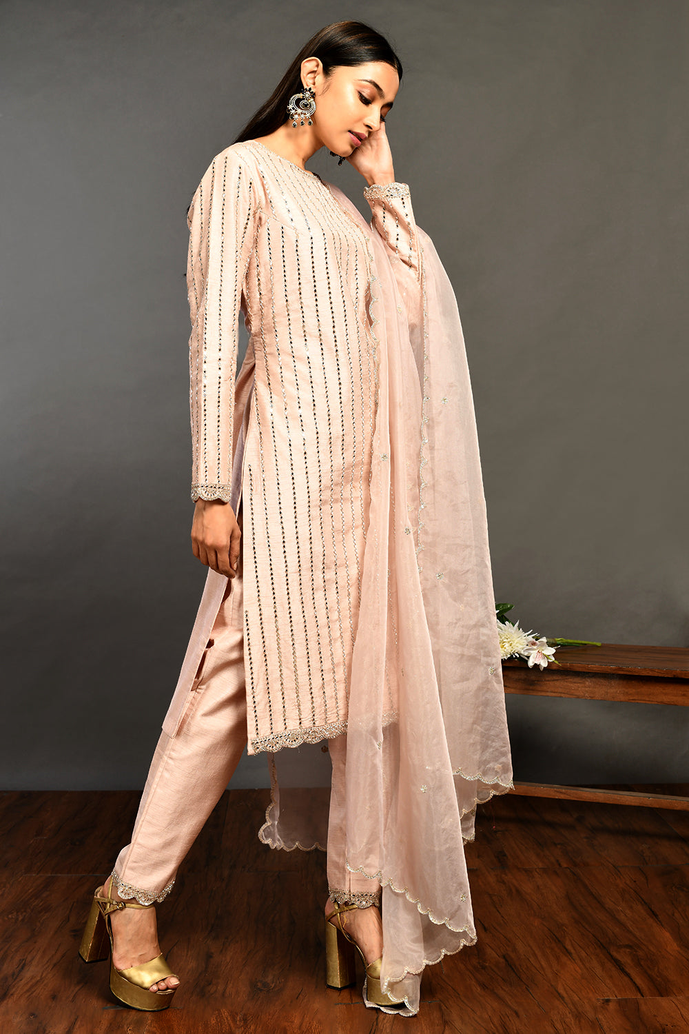 Buy beautiful powder pink mirror work silk suit online in USA with organza dupatta. Dazzle on weddings and special occasions with exquisite Indian designer dresses, sharara suits, Anarkali suits, wedding lehengas from Pure Elegance Indian fashion store in USA.-side