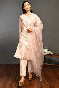 Buy beautiful powder pink mirror work silk suit online in USA with organza dupatta. Dazzle on weddings and special occasions with exquisite Indian designer dresses, sharara suits, Anarkali suits, wedding lehengas from Pure Elegance Indian fashion store in USA.-full view