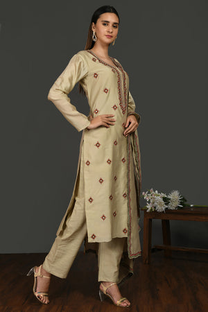 Shop beige embroidered chanderi cotton suit online in USA with dupatta. Dazzle on weddings and special occasions with exquisite Indian designer dresses, sharara suits, Anarkali suits, wedding lehengas from Pure Elegance Indian fashion store in USA.-side