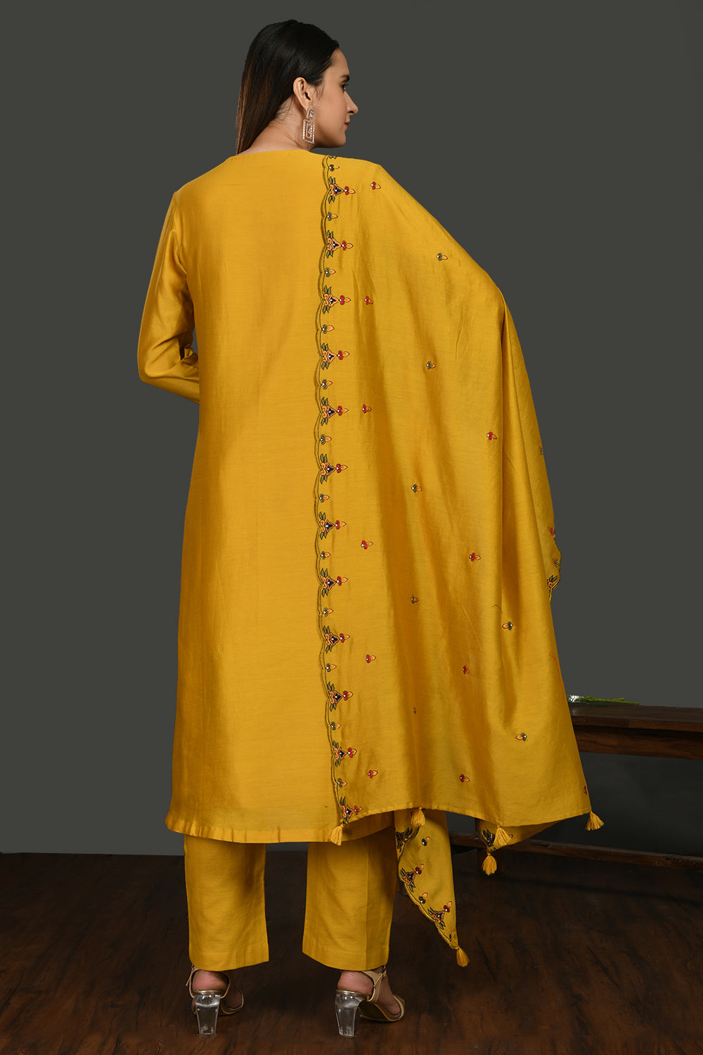 Shop mustard embroidered chanderi cotton suit online in USA with dupatta. Dazzle on weddings and special occasions with exquisite Indian designer dresses, sharara suits, Anarkali suits, wedding lehengas from Pure Elegance Indian fashion store in USA.-back