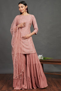 Shop stunning pink embroidered sharara suit online in USA with dupatta. Dazzle on weddings and special occasions with exquisite Indian designer dresses, sharara suits, Anarkali suits, wedding lehengas from Pure Elegance Indian fashion store in USA.-full view