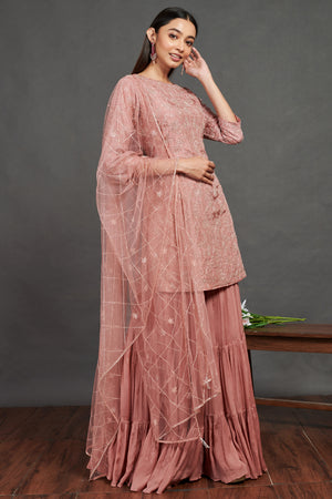 Shop stunning pink embroidered sharara suit online in USA with dupatta. Dazzle on weddings and special occasions with exquisite Indian designer dresses, sharara suits, Anarkali suits, wedding lehengas from Pure Elegance Indian fashion store in USA.-right