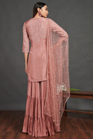 Shop stunning pink embroidered sharara suit online in USA with dupatta. Dazzle on weddings and special occasions with exquisite Indian designer dresses, sharara suits, Anarkali suits, wedding lehengas from Pure Elegance Indian fashion store in USA.-back