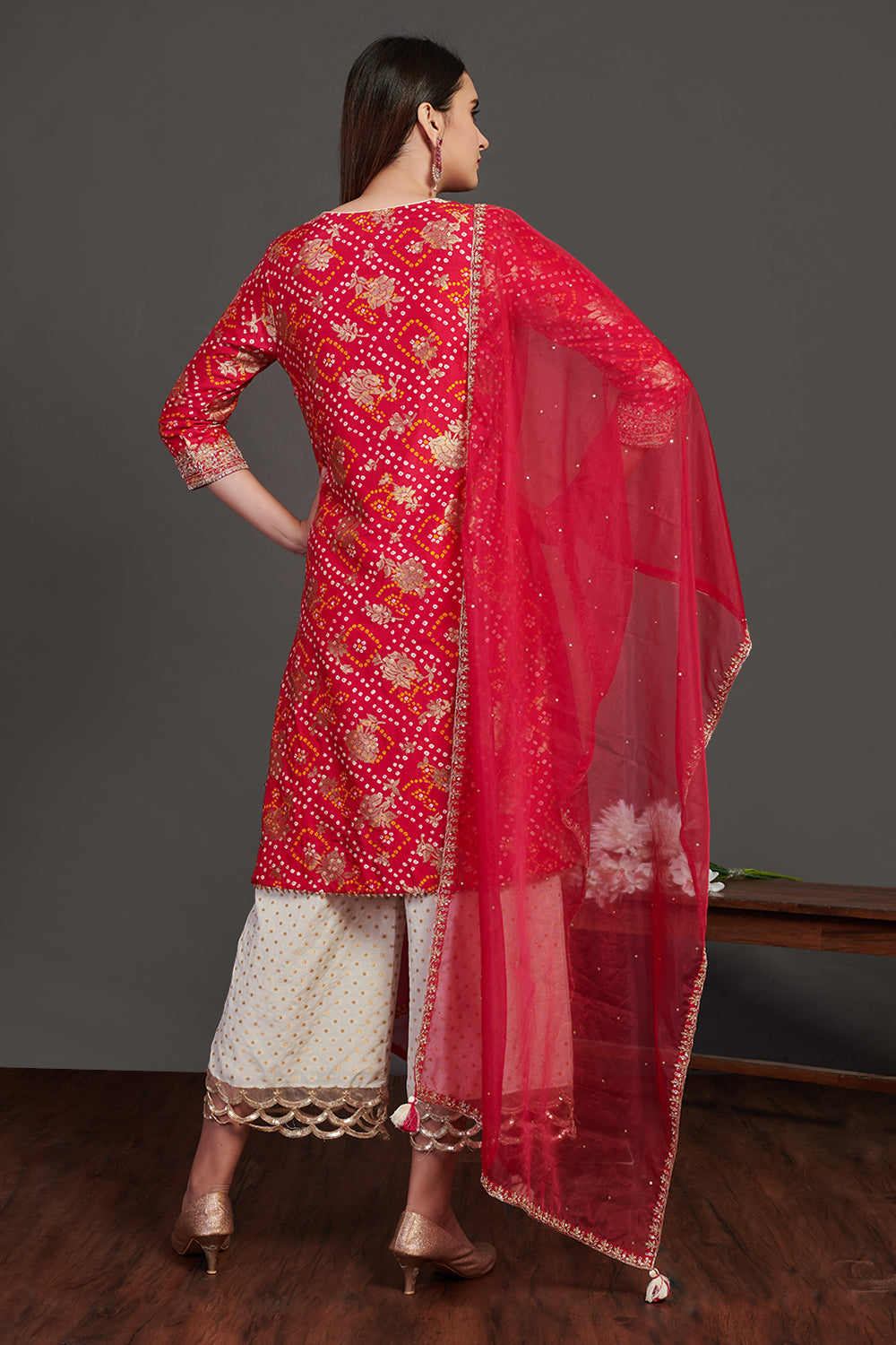 Buy red and white stone work bandhej palazzo suit online in USA with dupatta. Dazzle on weddings and special occasions with exquisite Indian designer dresses, sharara suits, Anarkali suits, wedding lehengas from Pure Elegance Indian fashion store in USA.-back