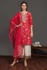 Buy red and white stone work bandhej palazzo suit online in USA with dupatta. Dazzle on weddings and special occasions with exquisite Indian designer dresses, sharara suits, Anarkali suits, wedding lehengas from Pure Elegance Indian fashion store in USA.-full view