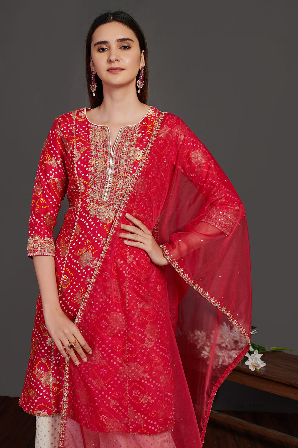 Buy red and white stone work bandhej palazzo suit online in USA with dupatta. Dazzle on weddings and special occasions with exquisite Indian designer dresses, sharara suits, Anarkali suits, wedding lehengas from Pure Elegance Indian fashion store in USA.-closeup