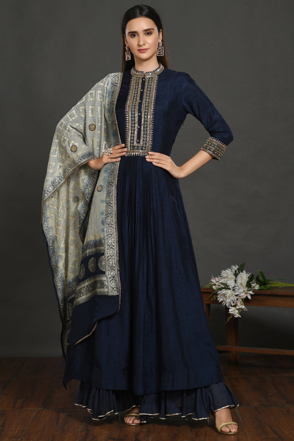 Shop navy blue embroidered Anarkali suit online in USA with grey dupatta. Dazzle on weddings and special occasions with exquisite Indian designer dresses, sharara suits, Anarkali suits, wedding lehengas from Pure Elegance Indian fashion store in USA.-full view