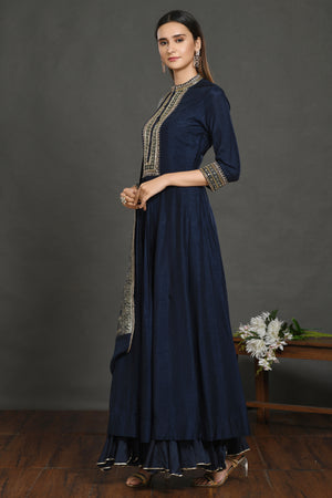 Shop navy blue embroidered Anarkali suit online in USA with grey dupatta. Dazzle on weddings and special occasions with exquisite Indian designer dresses, sharara suits, Anarkali suits, wedding lehengas from Pure Elegance Indian fashion store in USA.-side