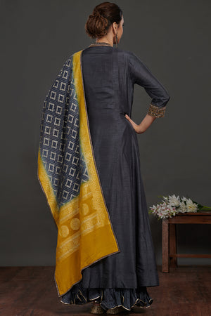 Buy grey embroidered Anarkali suit online in USA with grey yellow dupatta. Dazzle on weddings and special occasions with exquisite Indian designer dresses, sharara suits, Anarkali suits, wedding lehengas from Pure Elegance Indian fashion store in USA.-back