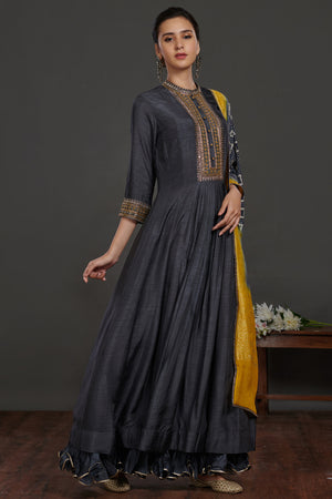 Buy grey embroidered Anarkali suit online in USA with grey yellow dupatta. Dazzle on weddings and special occasions with exquisite Indian designer dresses, sharara suits, Anarkali suits, wedding lehengas from Pure Elegance Indian fashion store in USA.-side