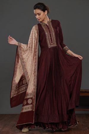 Shop wine color embroidered Anarkali suit online in USA with pink dupatta. Dazzle on weddings and special occasions with exquisite Indian designer dresses, sharara suits, Anarkali suits, wedding lehengas from Pure Elegance Indian fashion store in USA.-suit