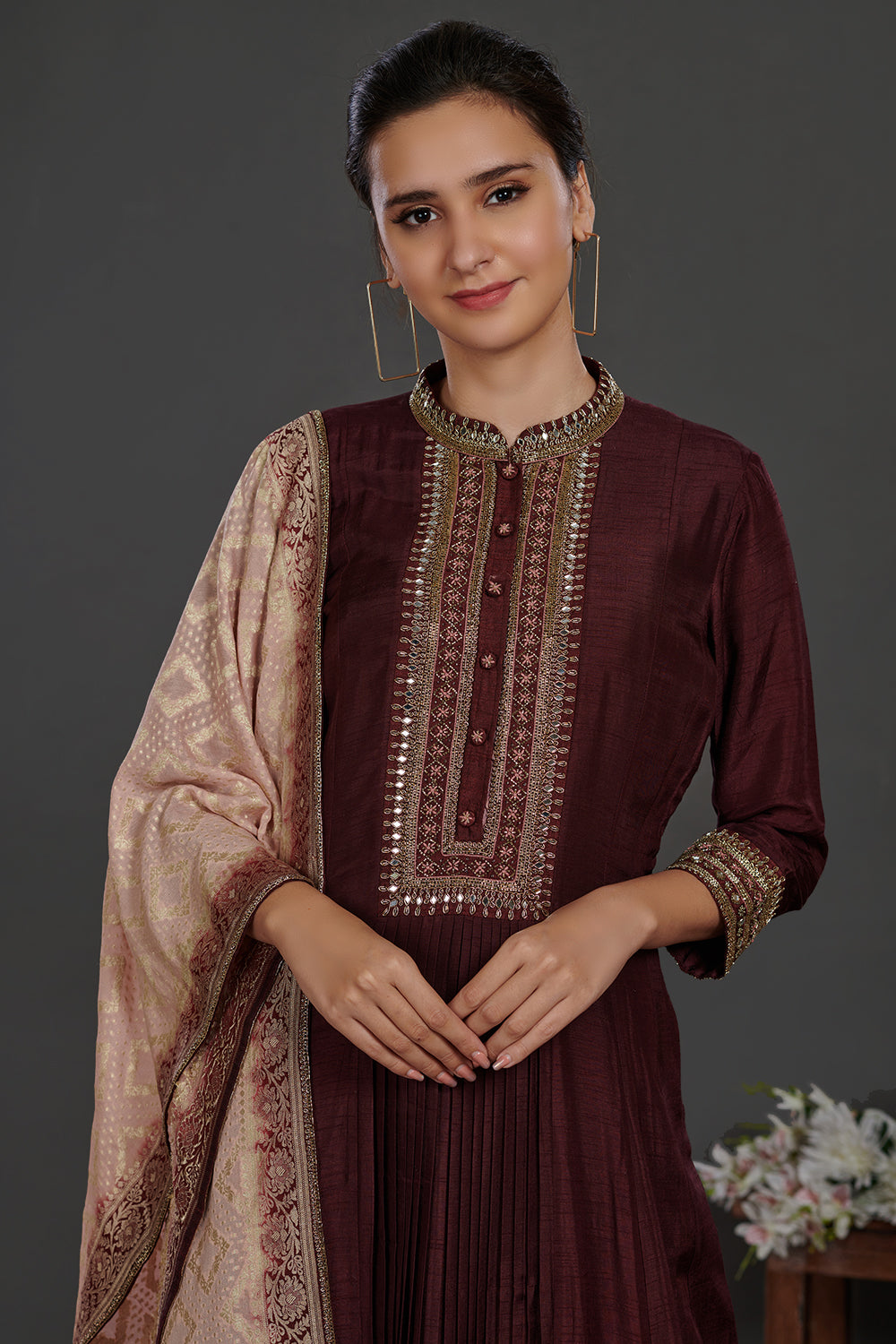 Shop wine color embroidered Anarkali suit online in USA with pink dupatta. Dazzle on weddings and special occasions with exquisite Indian designer dresses, sharara suits, Anarkali suits, wedding lehengas from Pure Elegance Indian fashion store in USA.-closeup