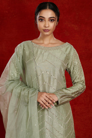 Buy sage green embellished silk kurta with pants online in USA. Dazzle on weddings and special occasions with exquisite Indian designer dresses, sharara suits, Anarkali suits, wedding lehengas from Pure Elegance Indian fashion store in USA.-closeup