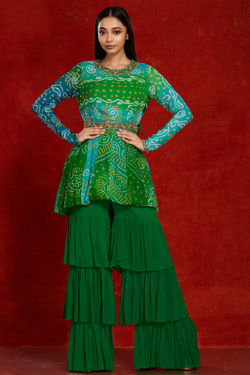 Shop green bandhej georgette sharara suit online in USA with sequin belt. Dazzle on weddings and special occasions with exquisite Indian designer dresses, sharara suits, Anarkali suits, wedding lehengas from Pure Elegance Indian fashion store in USA.-full view