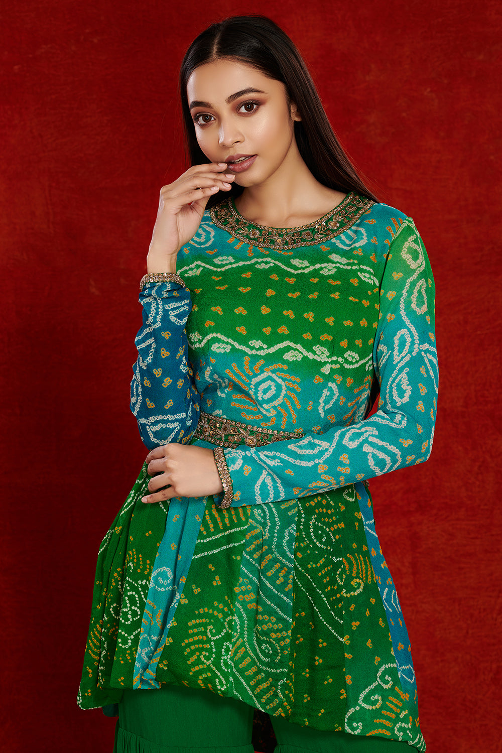 Shop green bandhej georgette sharara suit online in USA with sequin belt. Dazzle on weddings and special occasions with exquisite Indian designer dresses, sharara suits, Anarkali suits, wedding lehengas from Pure Elegance Indian fashion store in USA.-closeup