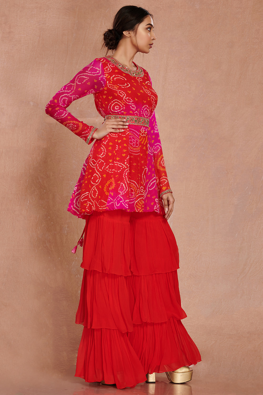 Buy red pink bandhej georgette sharara suit online in USA with sequin belt. Dazzle on weddings and special occasions with exquisite Indian designer dresses, sharara suits, Anarkali suits, wedding lehengas from Pure Elegance Indian fashion store in USA.-side