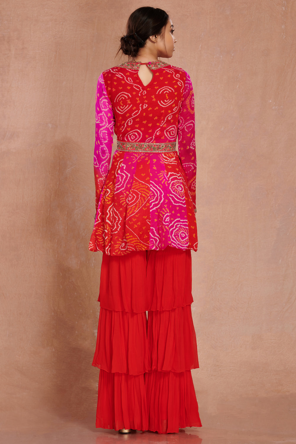 Buy red pink bandhej georgette sharara suit online in USA with sequin belt. Dazzle on weddings and special occasions with exquisite Indian designer dresses, sharara suits, Anarkali suits, wedding lehengas from Pure Elegance Indian fashion store in USA.-back