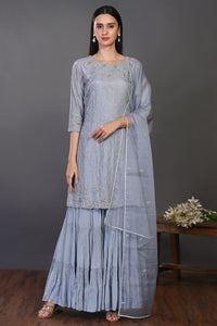 Buy stunning doctor blue embroidered silk sharara suit online in USA. Dazzle on weddings and special occasions with exquisite Indian designer dresses, sharara suits, Anarkali suits, wedding lehengas from Pure Elegance Indian fashion store in USA.-full view