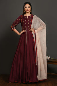 Buy wine embroidered muslin Anarkali suit online in USA with dupatta. Dazzle on weddings and special occasions with exquisite Indian designer dresses, sharara suits, Anarkali suits, wedding lehengas from Pure Elegance Indian fashion store in USA.-full view