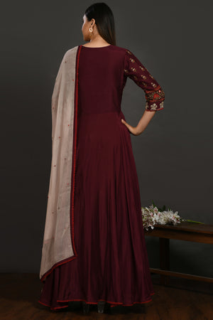 Buy wine embroidered muslin Anarkali suit online in USA with dupatta. Dazzle on weddings and special occasions with exquisite Indian designer dresses, sharara suits, Anarkali suits, wedding lehengas from Pure Elegance Indian fashion store in USA.-back