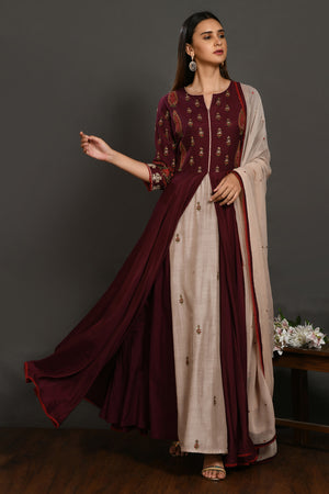 Buy wine embroidered muslin Anarkali suit online in USA with dupatta. Dazzle on weddings and special occasions with exquisite Indian designer dresses, sharara suits, Anarkali suits, wedding lehengas from Pure Elegance Indian fashion store in USA.-front