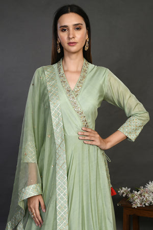 Buy pista green muslin Anarkali suit online in USA with dupatta. Dazzle on weddings and special occasions with exquisite Indian designer dresses, sharara suits, Anarkali suits, wedding lehengas from Pure Elegance Indian fashion store in USA.-closeup
