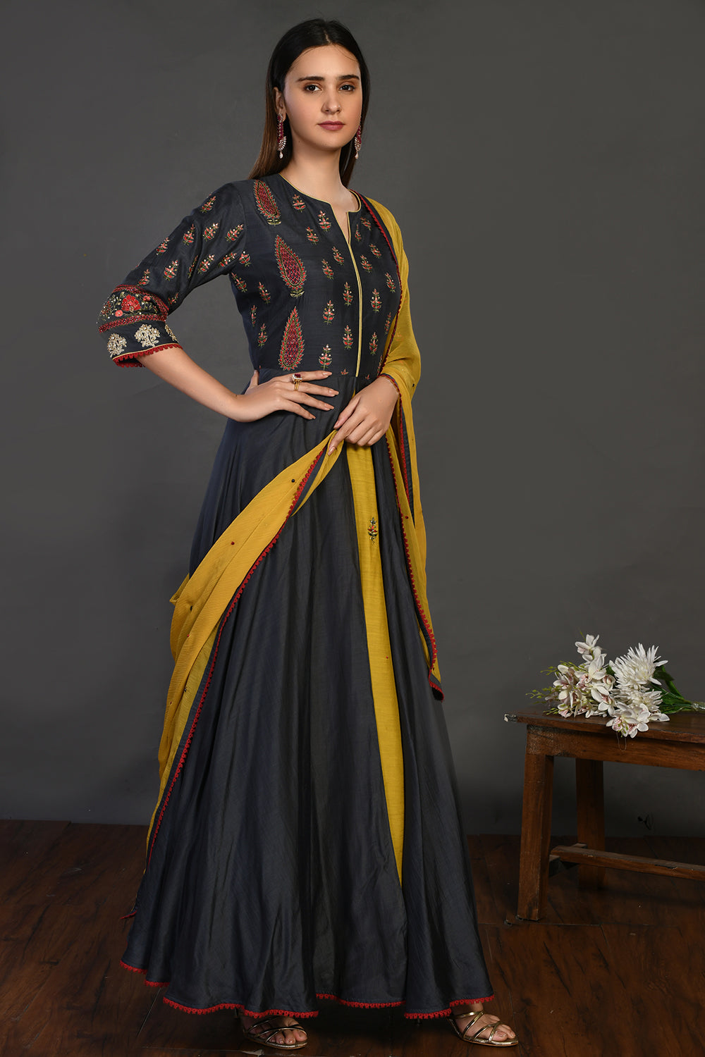 Buy grey stone work Anarkali suit online in USA with yellow dupatta. Dazzle on weddings and special occasions with exquisite Indian designer dresses, sharara suits, Anarkali suits, wedding lehengas from Pure Elegance Indian fashion store in USA.-full view