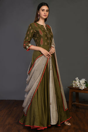 Shop green stone work Anarkali suit online in USA with beige dupatta. Dazzle on weddings and special occasions with exquisite Indian designer dresses, sharara suits, Anarkali suits, wedding lehengas from Pure Elegance Indian fashion store in USA.-right
