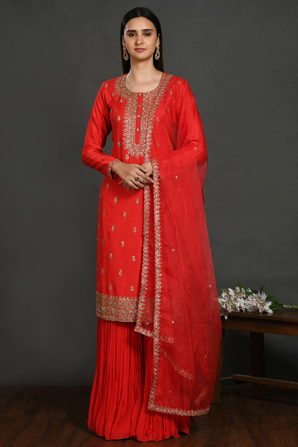 Buy red embroidered kurta set online in USA with bandhej dupatta. Dazzle on weddings and special occasions with exquisite Indian designer dresses, sharara suits, Anarkali suits, wedding lehengas from Pure Elegance Indian fashion store in USA.-full view