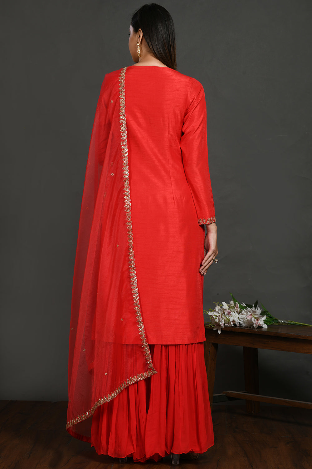 Buy red embroidered kurta set online in USA with bandhej dupatta. Dazzle on weddings and special occasions with exquisite Indian designer dresses, sharara suits, Anarkali suits, wedding lehengas from Pure Elegance Indian fashion store in USA.-back