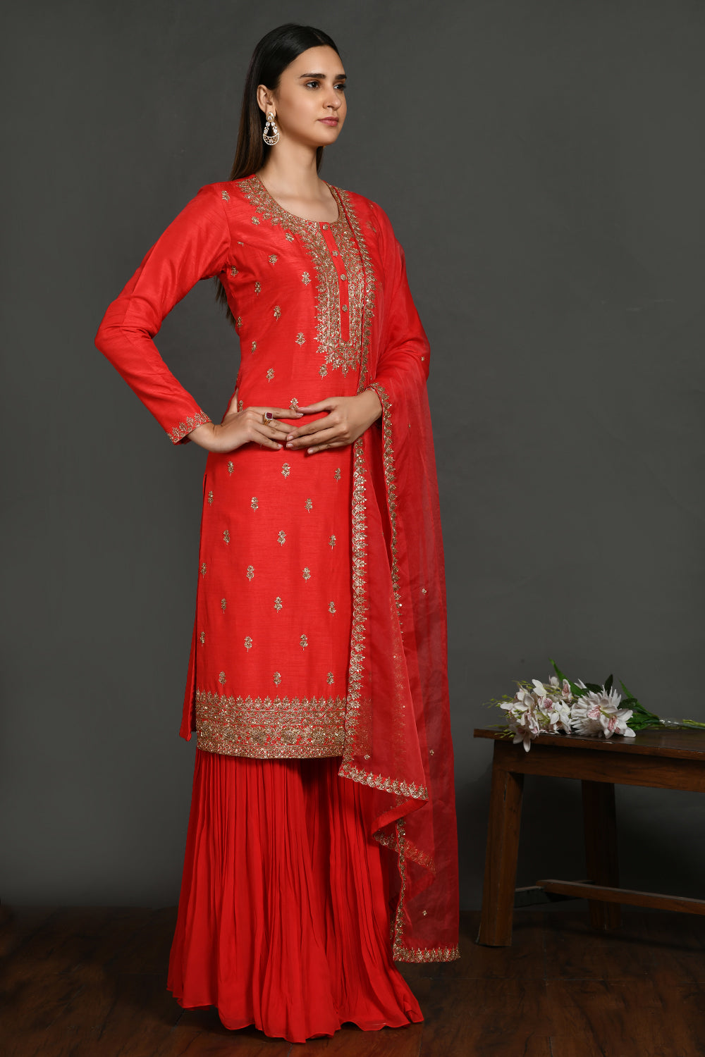 Buy red embroidered kurta set online in USA with bandhej dupatta. Dazzle on weddings and special occasions with exquisite Indian designer dresses, sharara suits, Anarkali suits, wedding lehengas from Pure Elegance Indian fashion store in USA.-side