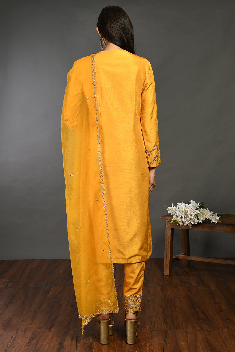 Shop yellow zardozi work Mysore silk suit online in USA with dupatta. Dazzle on weddings and special occasions with exquisite Indian designer dresses, sharara suits, Anarkali suits, wedding lehengas from Pure Elegance Indian fashion store in USA.-back