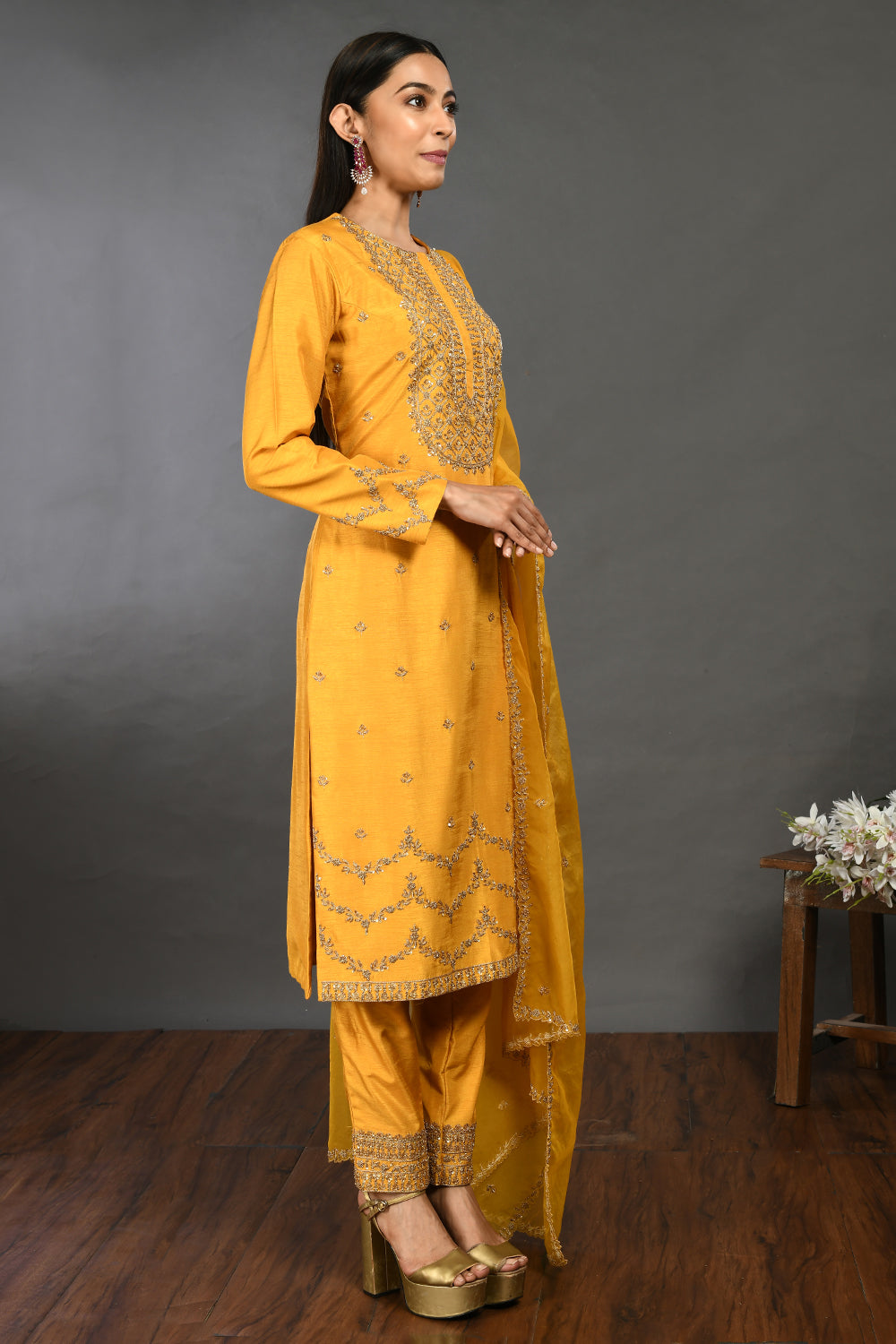 Shop yellow zardozi work Mysore silk suit online in USA with dupatta. Dazzle on weddings and special occasions with exquisite Indian designer dresses, sharara suits, Anarkali suits, wedding lehengas from Pure Elegance Indian fashion store in USA.-side