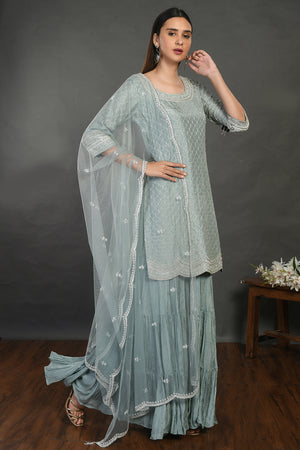 Shop doctor blue embroidered sharara suit online in USA with dupatta. Dazzle on weddings and special occasions with exquisite Indian designer dresses, sharara suits, Anarkali suits, wedding lehengas from Pure Elegance Indian fashion store in USA.-right