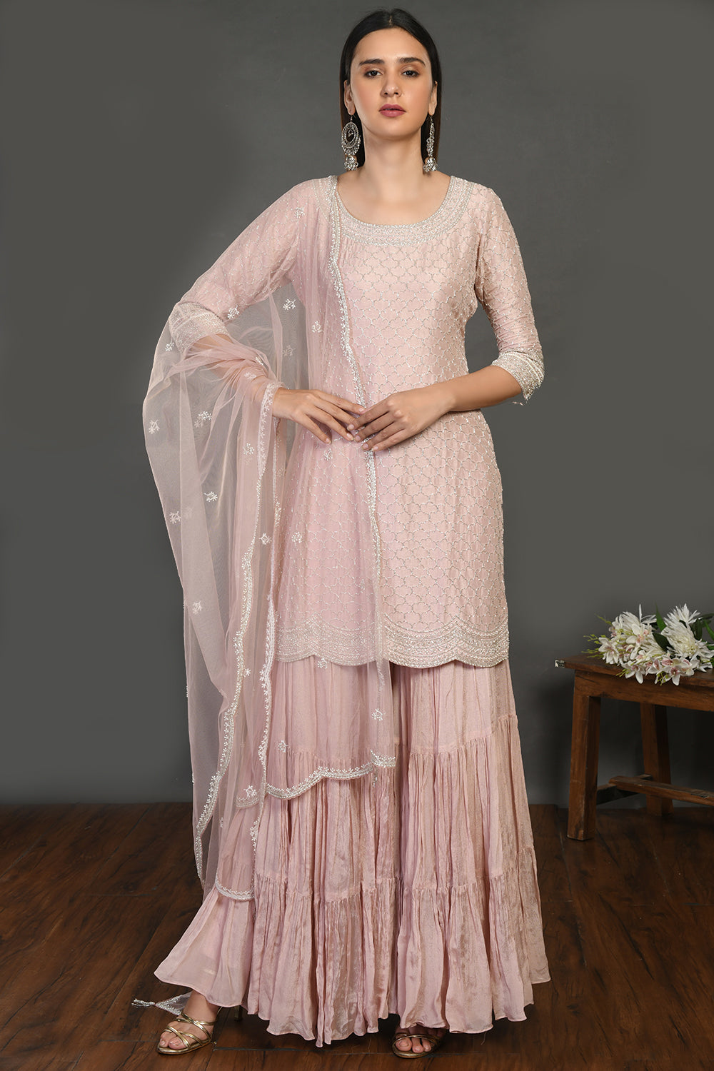 Buy powder pink embroidered sharara suit online in USA with dupatta. Dazzle on weddings and special occasions with exquisite Indian designer dresses, sharara suits, Anarkali suits, wedding lehengas from Pure Elegance Indian fashion store in USA.-full view