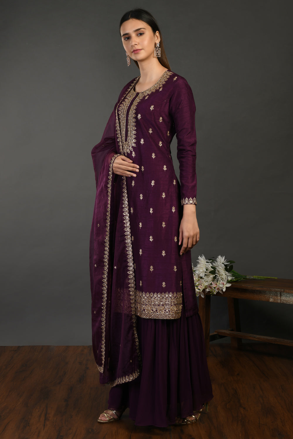 Shop wine hue zari work georgette suit online in USA with dupatta. Dazzle on weddings and special occasions with exquisite Indian designer dresses, sharara suits, Anarkali suits, wedding lehengas from Pure Elegance Indian fashion store in USA.-side