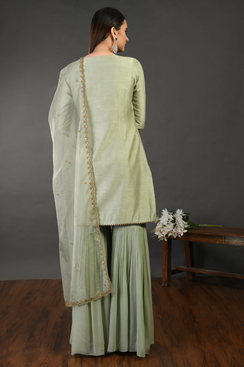 Buy sage green embroidered Mysore silk sharara suit online in USA with dupatta. Dazzle on weddings and special occasions with exquisite Indian designer dresses, sharara suits, Anarkali suits, wedding lehengas from Pure Elegance Indian fashion store in USA.-back