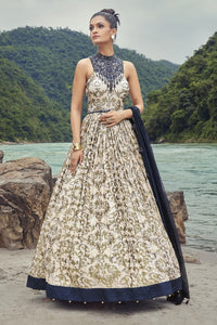 Buy a Beautiful off-white self-embroidered georgette anarkali sleeveless suit with blue dupatta. Shop online from Pure Elegance. online in the USA with a dupatta. Dazzle on weddings and special occasions with exquisite Indian designer dresses, sharara suits, Anarkali suits, and wedding lehengas from Pure Elegance Indian fashion store in the USA.