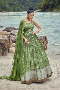 Buy a Beautiful green embroidered georgette anarkali suit with a dupatta. Shop online from Pure Elegance. Dazzle on weddings and special occasions with exquisite Indian designer dresses, sharara suits, Anarkali suits, and wedding lehengas from Pure Elegance Indian fashion store in the USA.