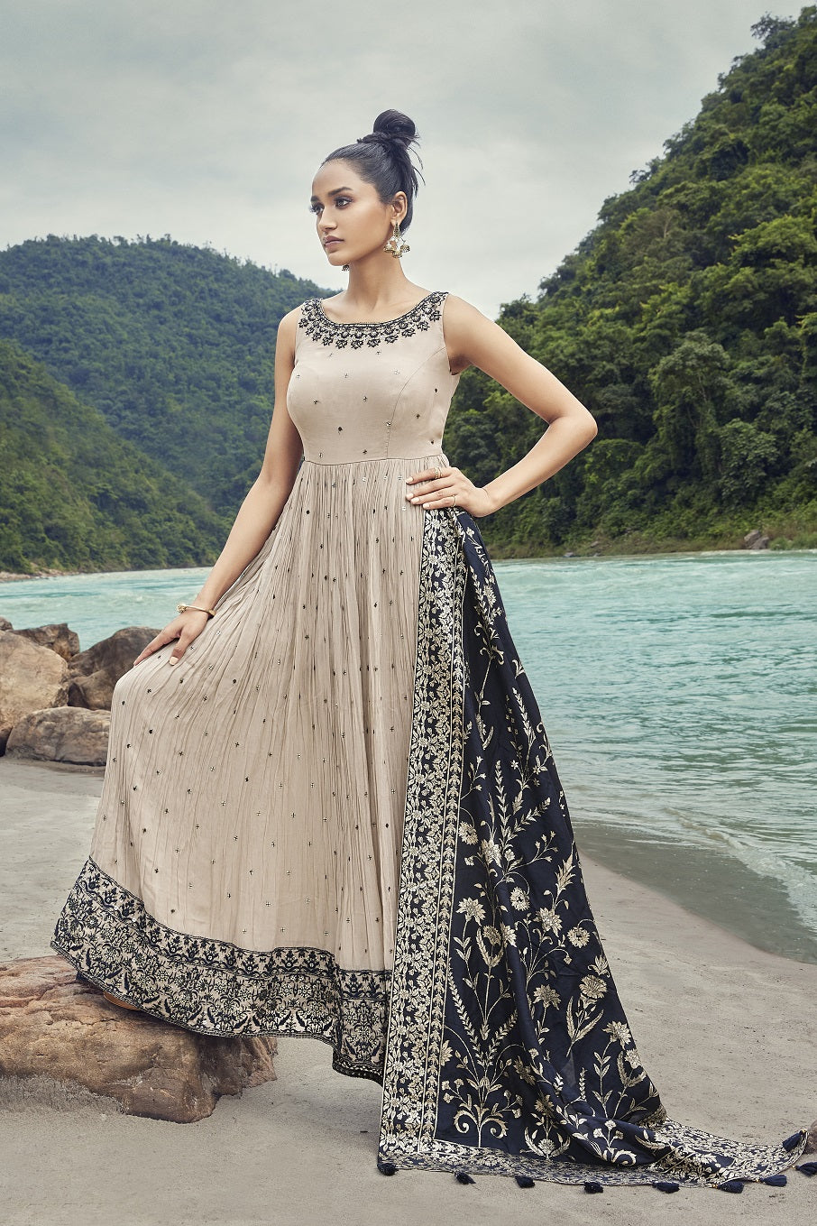 Buy a Beautiful ellow embroidered silk Anarkali suit with a dupatta. Shop online from Pure Elegance. Dazzle on weddings and special occasions with exquisite Indian designer dresses, sharara suits, Anarkali suits, and wedding lehengas from Pure Elegance Indian fashion store in the USA.