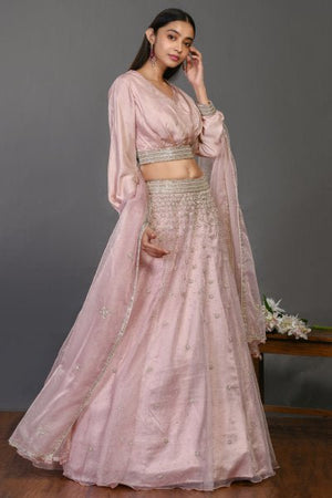 Buy beautiful pink organza lehenga online in USA with dupatta. Shop beautiful designer lehengas, wedding lehengas, Indian dresses, designer suits for special occasions from Pure Elegance Indian clothing store in USA.-side